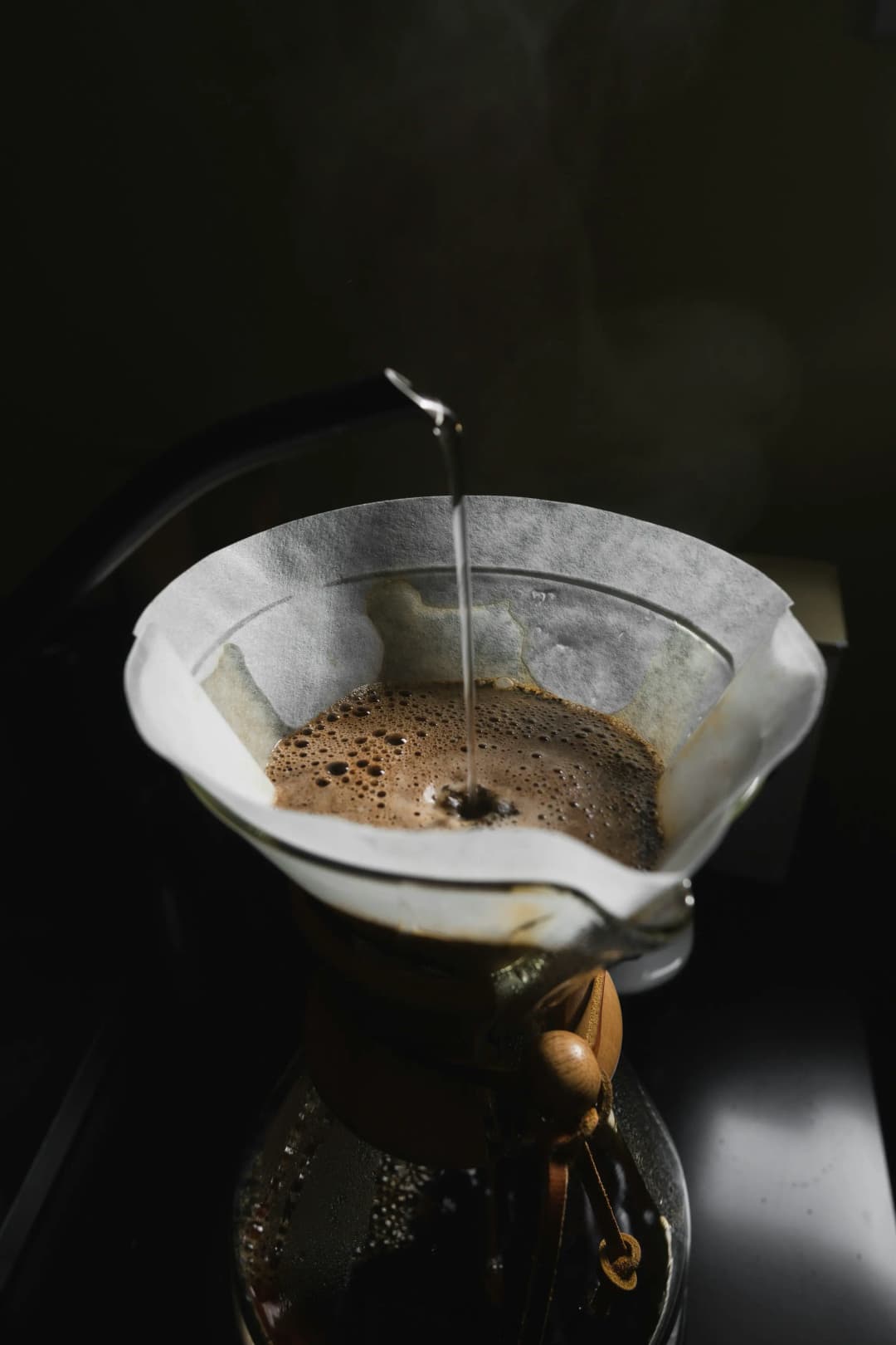 Artisan coffee beans roasting in a drum